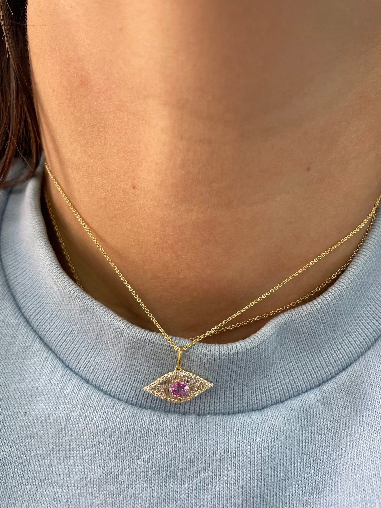 Large Diamond and Pink Sapphire Evil Eye Pendant.