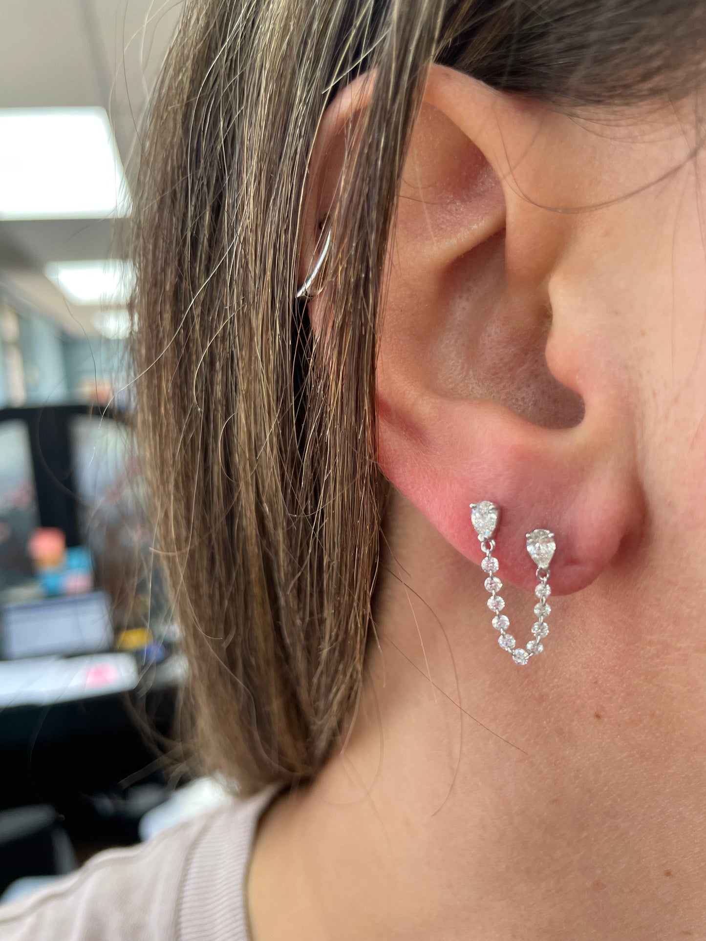 Single Row Floating Pear Diamond Earring