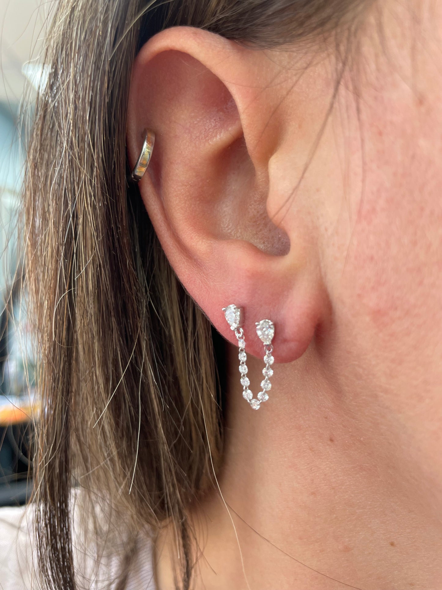 Single Row Floating Pear Diamond Earring