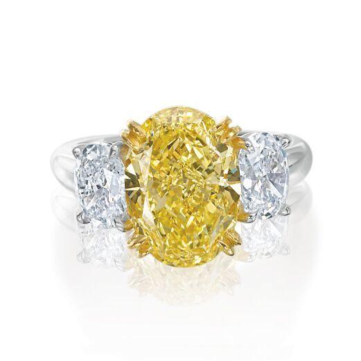 Oval Yellow and White Diamond Three Stone Engagement Ring