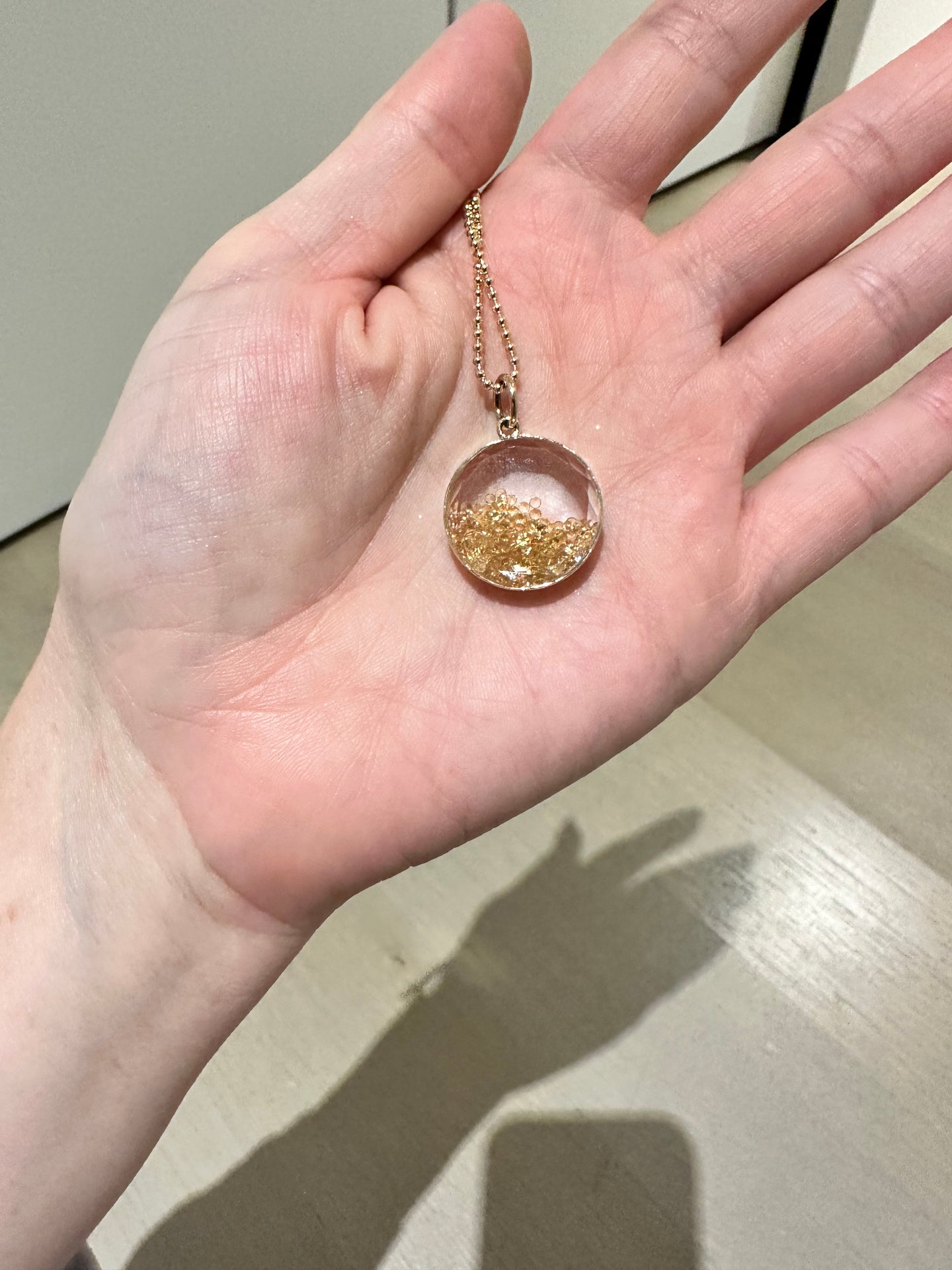 Sapphire Crystal Case and Citrine Shake Pendant