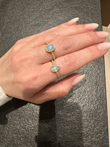 Oval Opal and Diamond Halo Ring - Three
