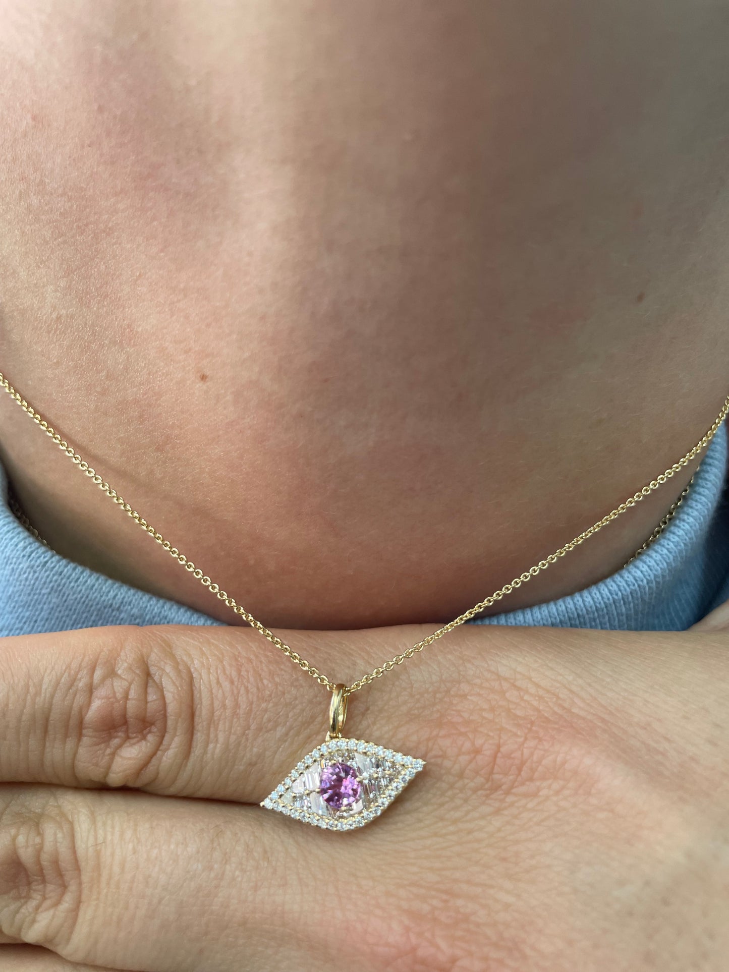 Large Diamond and Pink Sapphire Evil Eye Pendant.