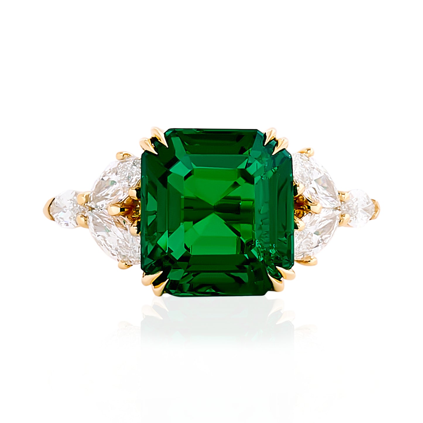 Green Emerald and Pear Shape Diamond Ring.